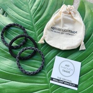 Set of 3 Black and Dark Blue Aid Through Trade Roll On Bracelets